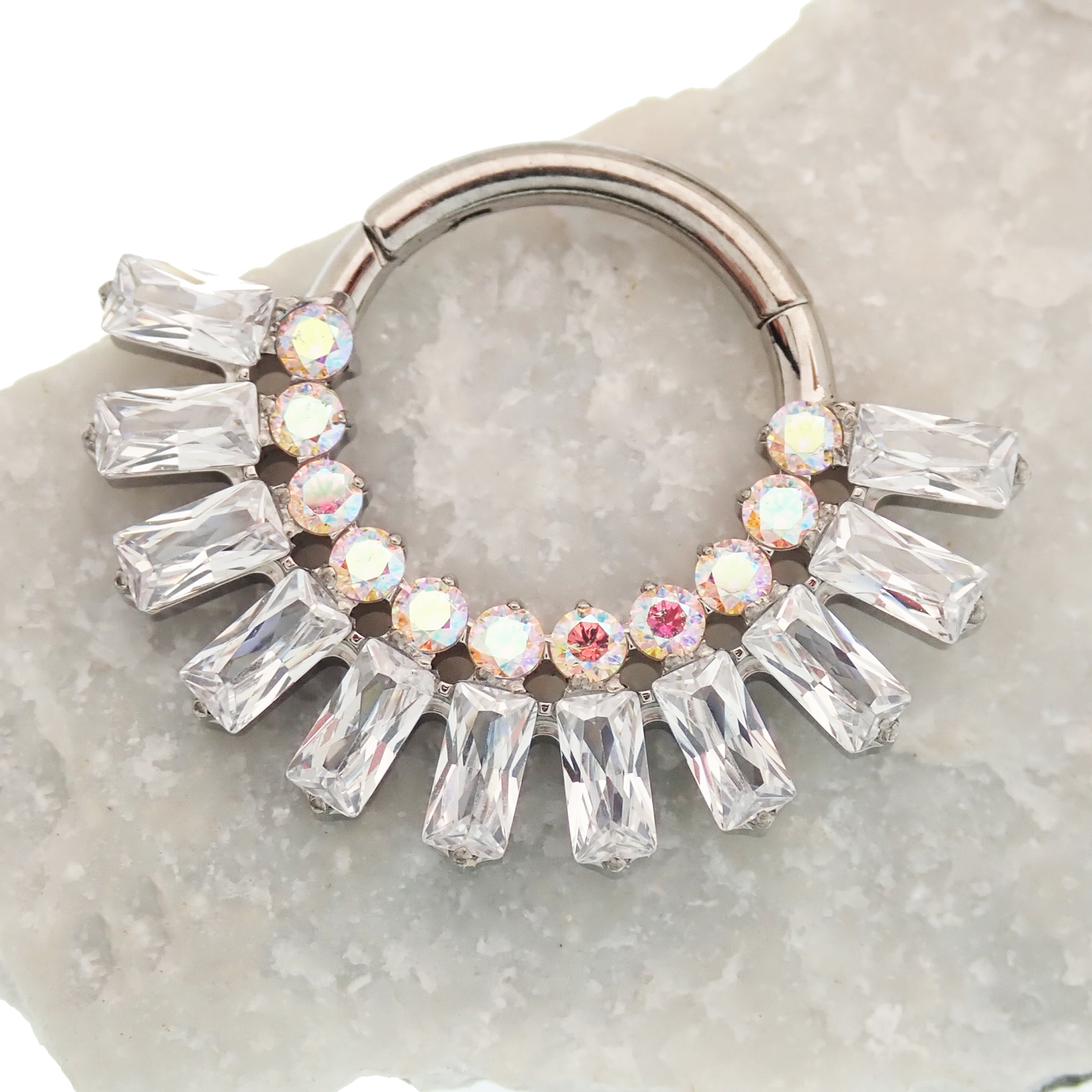 Magpie Super Nova CZ titanium septum clicker in cerise champagne with 8mm diameter and 16g gauge.