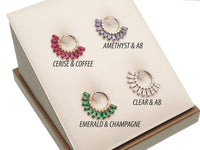 Magpie Super Nova CZ Titanium Septum Clicker in cerise and champagne with 8mm diameter and 16g gauge, featuring sparkling CZ stones.