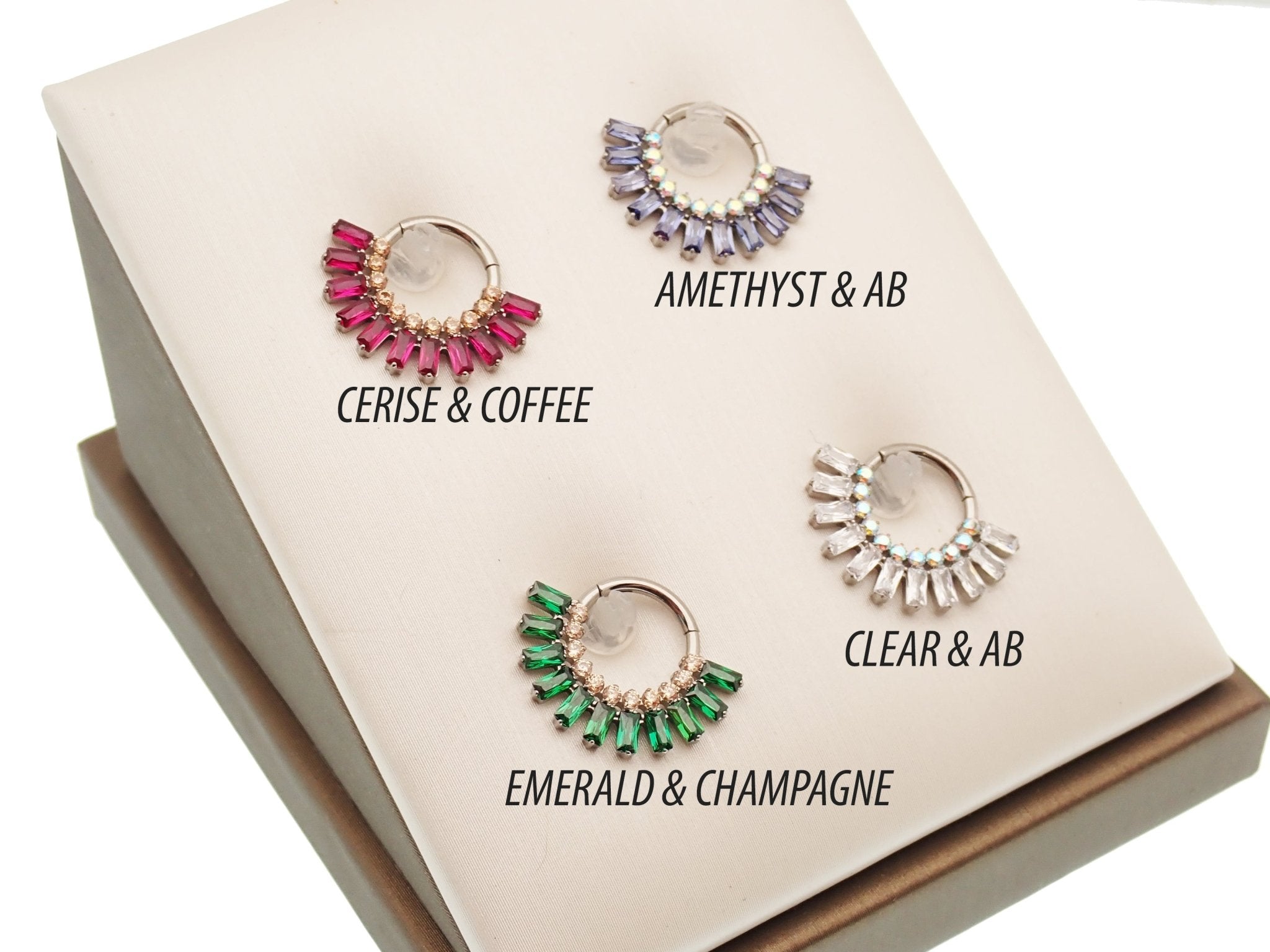 Magpie Super Nova CZ Titanium Septum Clicker in cerise and champagne with 8mm diameter and 16g gauge, featuring sparkling CZ stones.