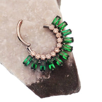 Magpie Super Nova CZ titanium septum clicker in cerise champagne color, 16 gauge, 8mm diameter, with sparkling crystal details.