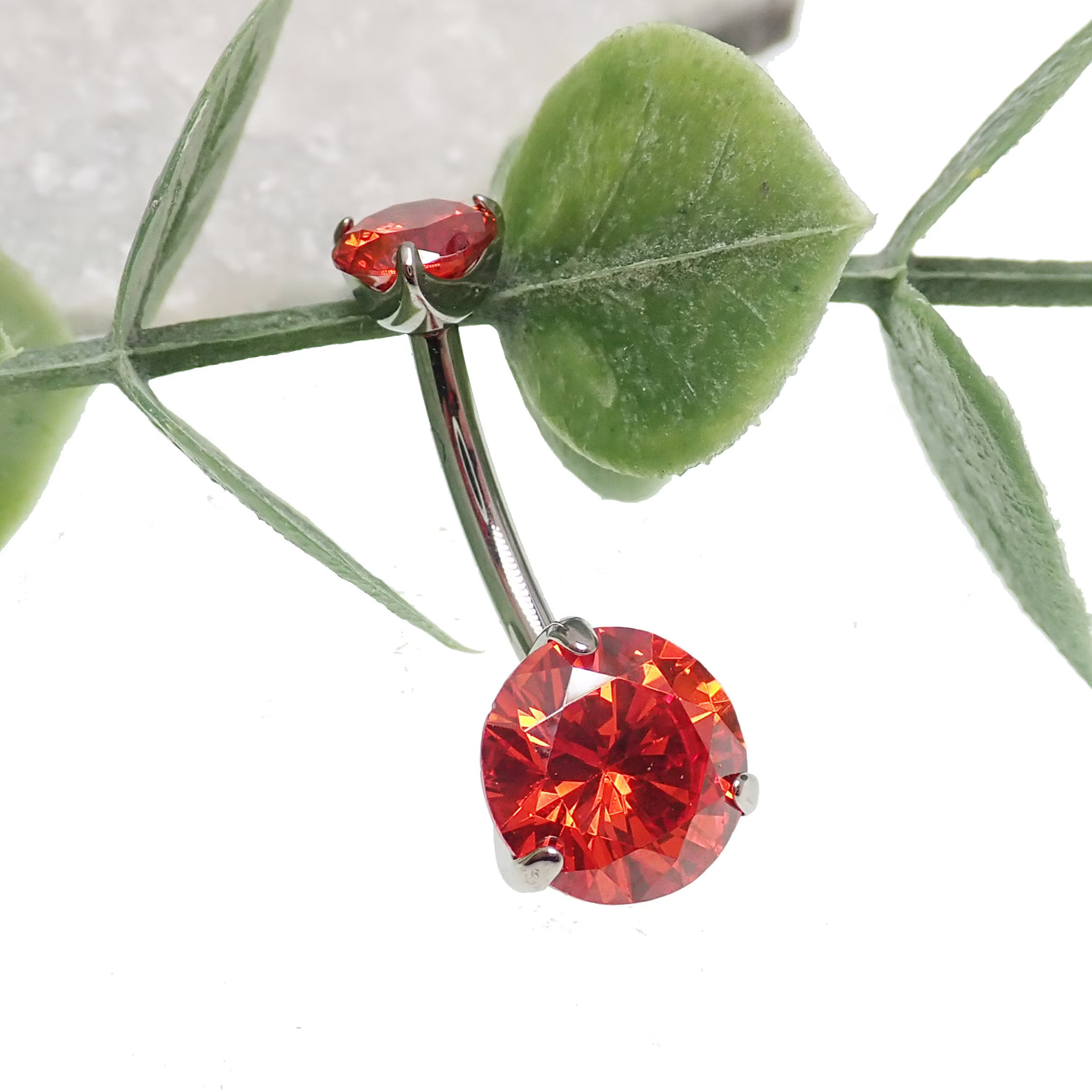 Red CZ prong belly ring in 14g body jewelry with sparkling cubic zirconia from Body Clickers Body Jewelry.