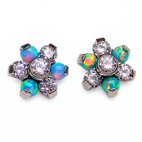 Titanium 18G flower flatback attachment with yellow opal and CZ stones, featuring moon design and floral detailing.