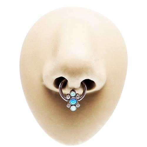 Titanium cluster blue opal closure ring by Body Clickers, 16g gauge, 10mm diameter, with blue opal stones and sleek metal finish.