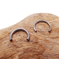 Body Clickers 16G titanium internally threaded horseshoe circular ring for body piercing, featuring a sleek, curved design.