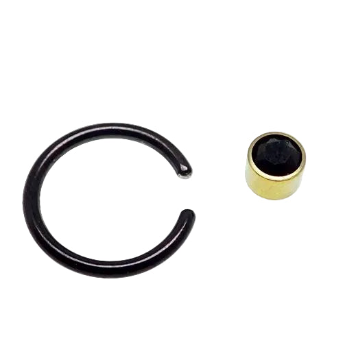 Titanium black and gold CBR onyx ring, 14g, with black and gold design, featuring a sleek, polished appearance.
