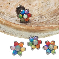 Mixed opal rainbow flower titanium flatback piercing in 14g with colorful floral design, ideal for body jewelry.