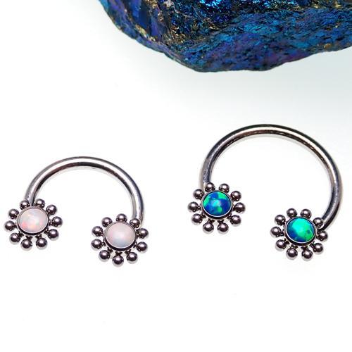 Peacock blue Opal Sun circular body rings by Body Clickers, 16g gauge, featuring a vibrant, circular design for body piercing.