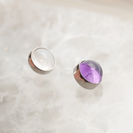 Amethyst and cloudy moonstone titanium flatback piercing in 14g with silver-tone finish, designed for body jewelry.