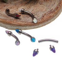Spiked opal cone jewelry with curved barbell in 16g, black fire design, for body piercing accessories by Body Clickers.
