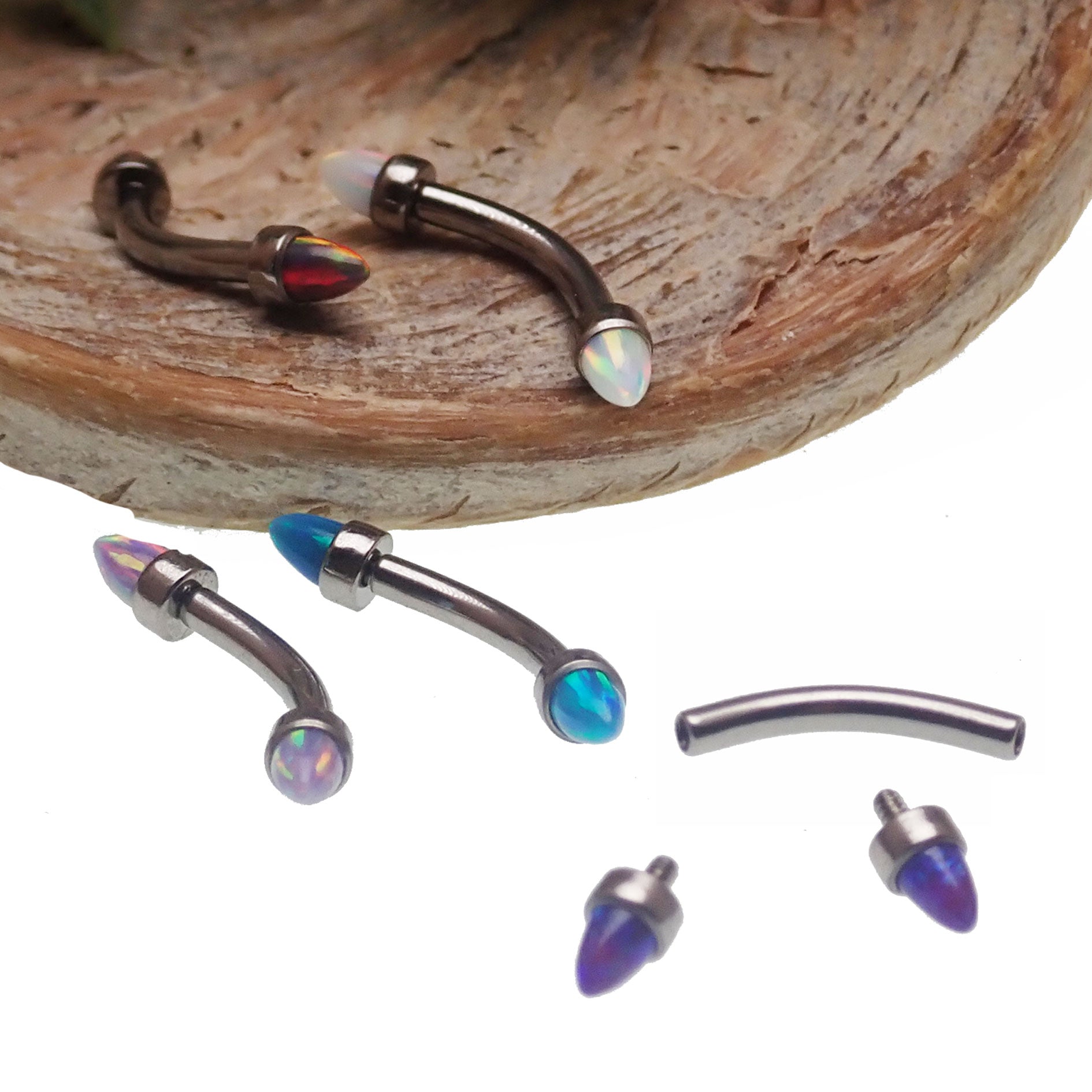 Spiked opal cone jewelry with curved barbell in 16g, black fire design, for body piercing accessories by Body Clickers.