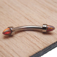 Black fire spiked opal cone with curved barbell 16g, body jewelry from Body Clickers, featuring a bold, edgy design.