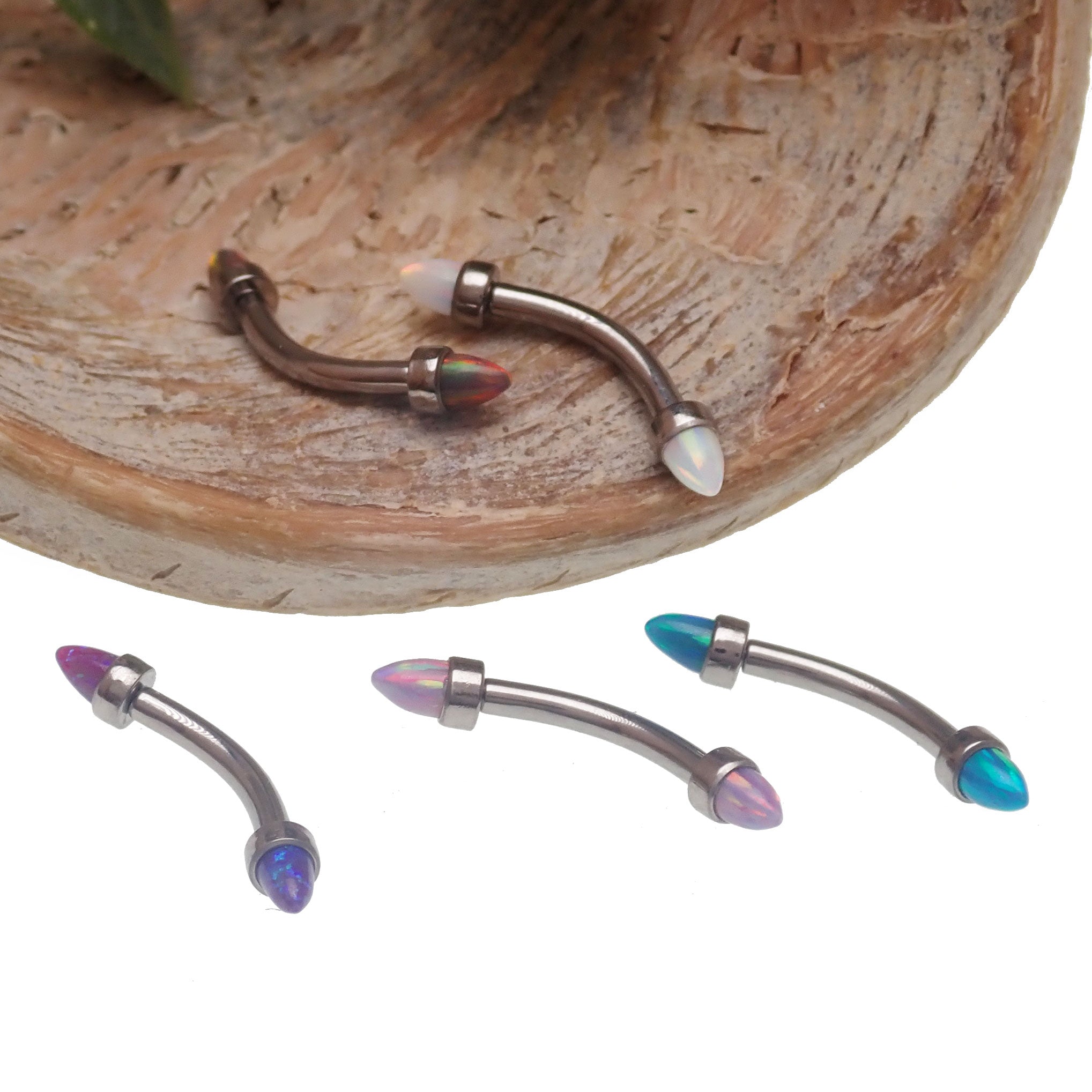 Spiked black opal cone jewelry with curved barbell in 16g, Body Clickers apparel and accessories, body piercing jewelry.
