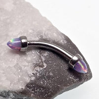 Black fire spiked opal cone jewelry with curved 16g barbell for body piercing, featuring a striking spiked design and vibrant opal accents.