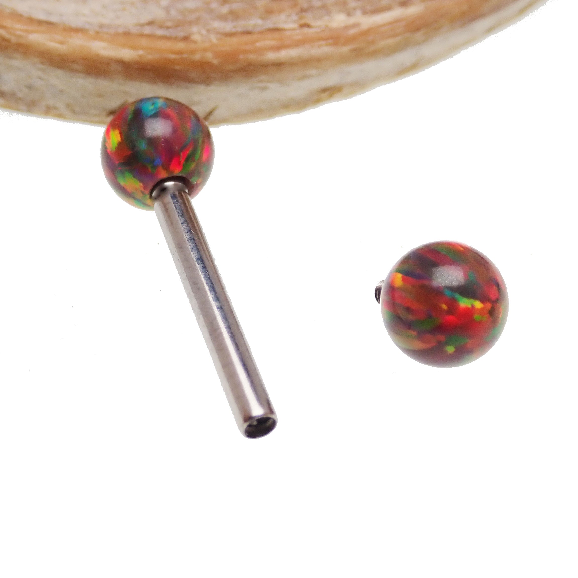 Dark cherry opal Body Clickers barbell piercing, 14g, 8mm length, with vibrant gemstone and metal shaft.