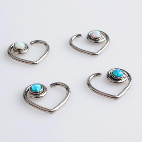 Peacock blue opal heart-shaped BCR piercing by Body Clickers, 16g, with a shiny, smooth heart-shaped design for ear or body piercing.