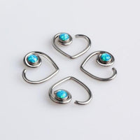 Opal heart-shaped BCR body jewelry by Body Clickers, 16g with peacock blue opal stone, designed for body piercing.