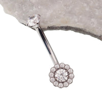 Titanium belly ring with clear cubic zirconia and azure blue opal accents, 10mm size, 14g gauge, by Body Clickers.