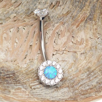 Titanium belly ring with a clear CZ and azure blue opal 10mm gemstone, 14g Body Clickers navel jewelry.