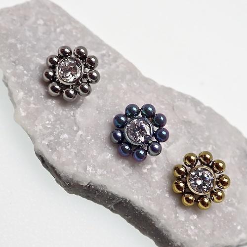 Beaded CZ flower and ball belly bar body jewelry in 14g with decorative flower and bead details.