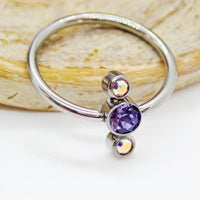 Black Tanzanite and AB crystal 3-stone cluster titanium body jewelry ring, 16g, by Body Clickers.