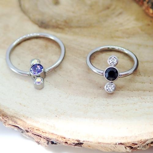 Black Tanzanite and AB crystal 3-stone cluster titanium body jewelry ring, 16g, by Body Clickers.