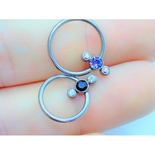 Black Tanzanite and AB crystal 3-stone cluster titanium body jewelry ring by Body Clickers, 16g, with a sleek modern design.