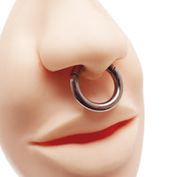 Plain titanium clicker body jewelry in 10g size, featuring a sleek, minimalist design with a smooth finish and secure click closure.