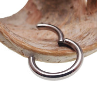 Plain titanium clicker body jewelry, 8g, with a 10mm diameter hoop from Body Clickers featuring a sleek, minimalist design.
