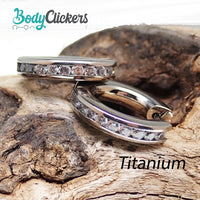 Titanium hinged hoop earrings by Body Clickers, 10mm body jewelry with smooth, polished surface and secure hinged closure.