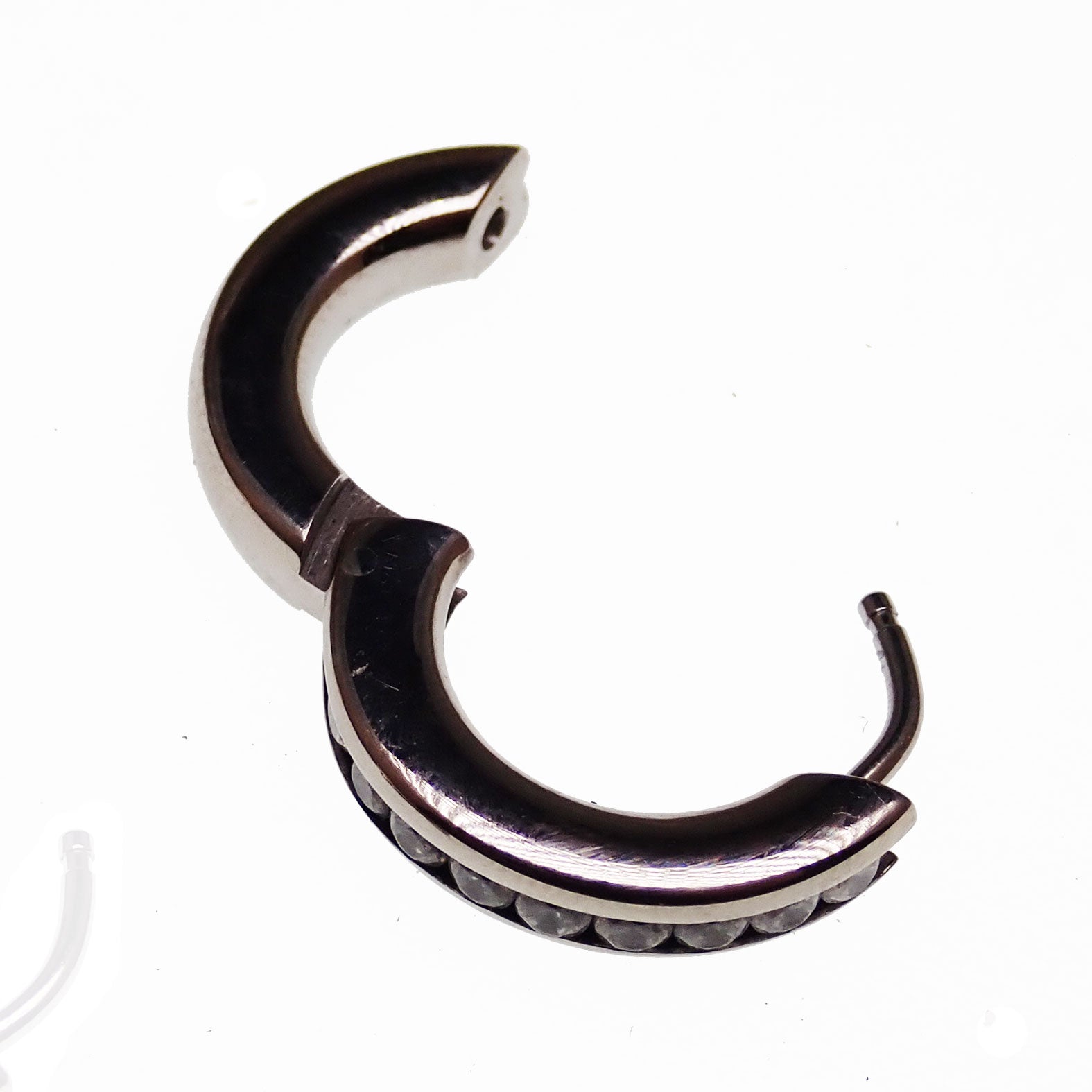 Titanium hinged hoop earrings from Body Clickers, 10mm body jewelry with a sleek, polished finish and secure hinged closure.
