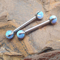 Cornflower blue opal titanium nipple jewelry by Body Clickers, 12g, 12mm bar with a vibrant blue gemstone.