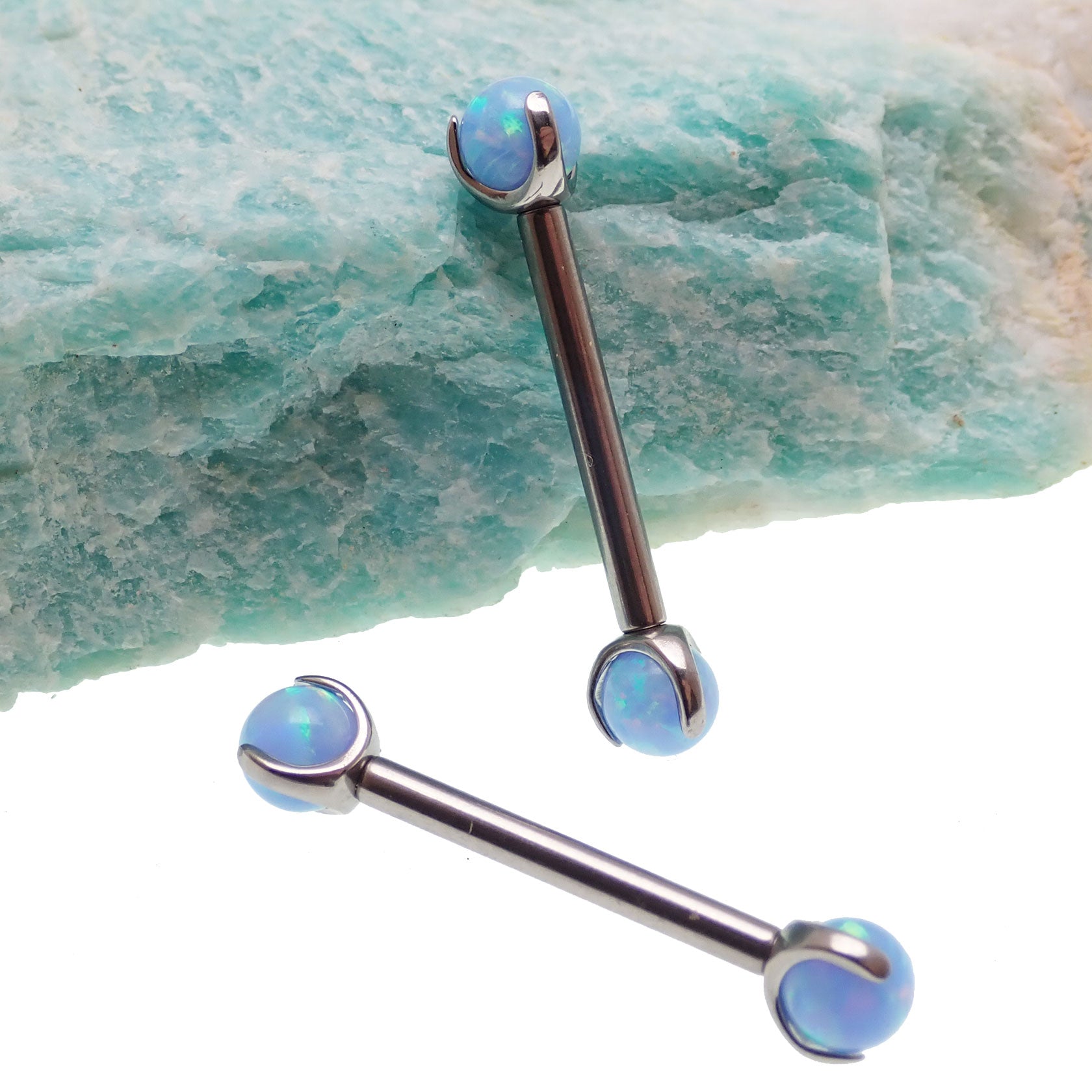 Cornflower blue opal titanium nipple jewelry by Body Clickers, 12 gauge, 12mm bar with vibrant blue stone and sleek titanium finish.