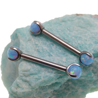 Cornflower blue opal titanium nipple jewelry in 12g size with 12mm length, featuring a polished, vibrant blue gemstone.