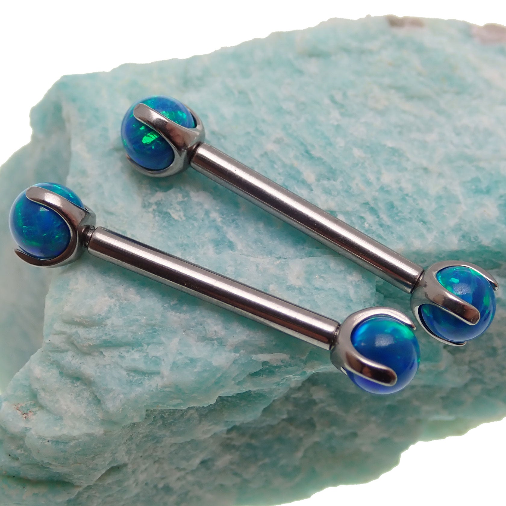Peacock blue opal titanium nipple bar jewelry with 12mm length and 12 gauge gauge, designed for body piercings.