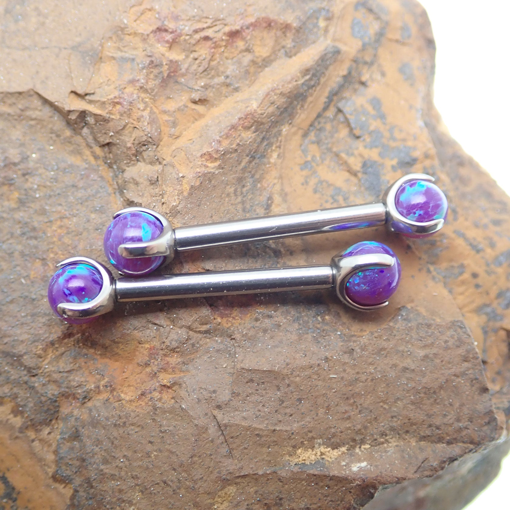 Body Clickers lavender opal nipple jewelry, 12g gauge and 12mm size, featuring a smooth, oval lavender opal gemstone.