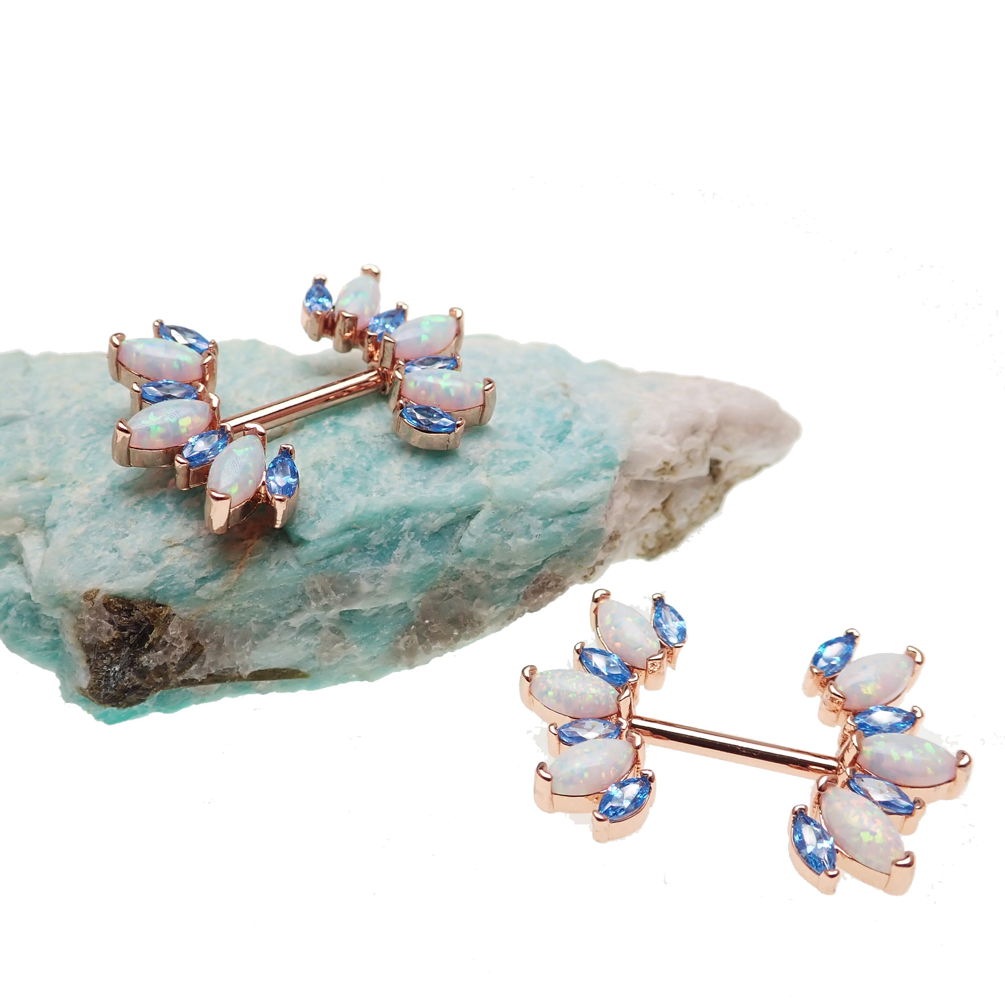 Blue CZ and white opal rose gold-dipped steel nipple bar, 14g body jewelry with decorative gemstone accents.