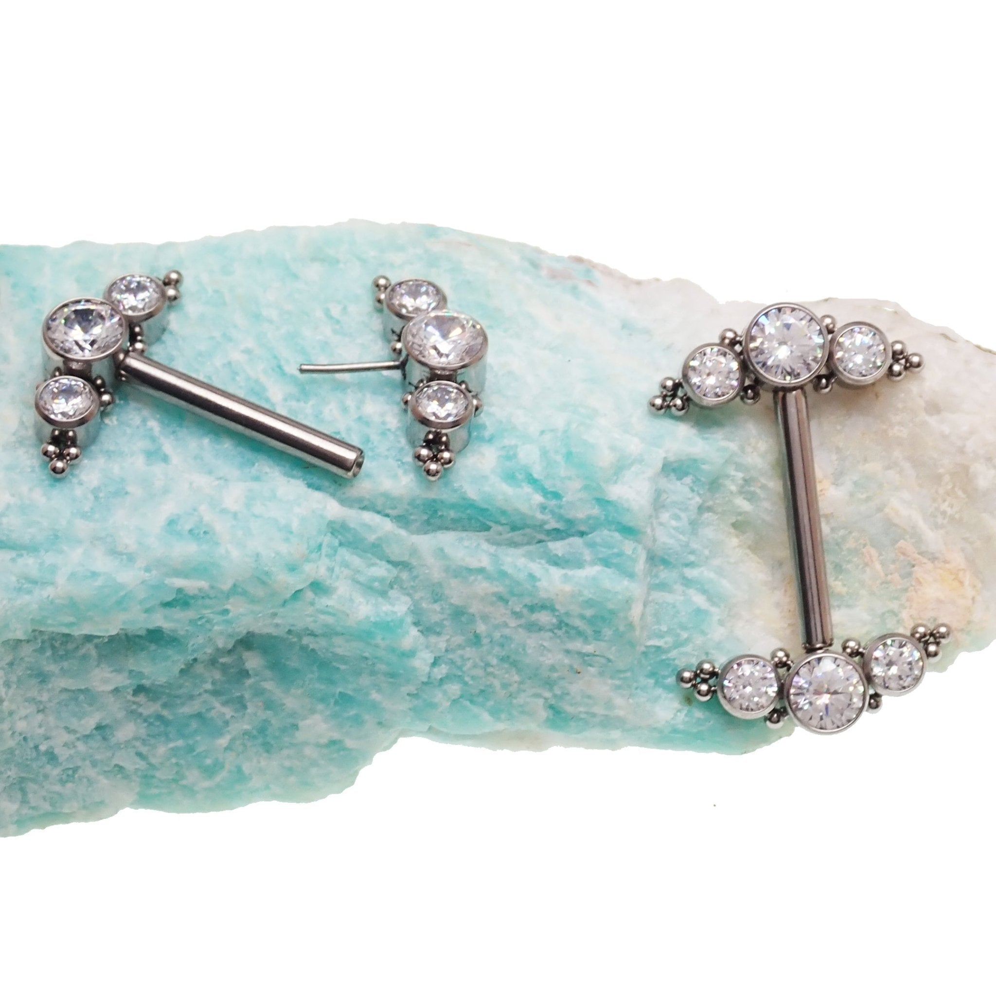 Clear CZ push fit nipple bar in 14g body jewelry by Body Clickers, featuring a sleek, transparent design with sparkling cubic zirconia accents.