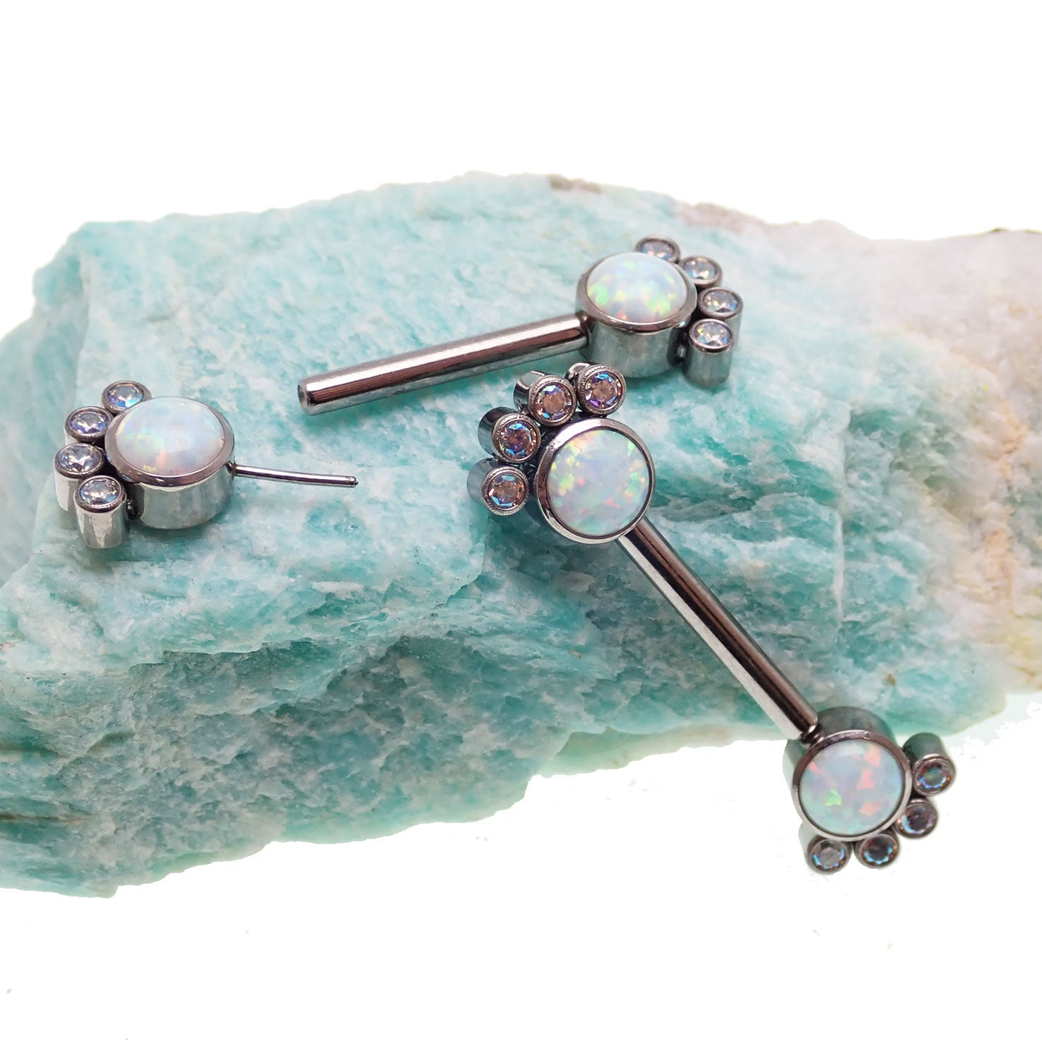 Paw print CZ and white opal nipple bar in 14g body jewelry by Body Clickers, featuring a 12mm paw print design.