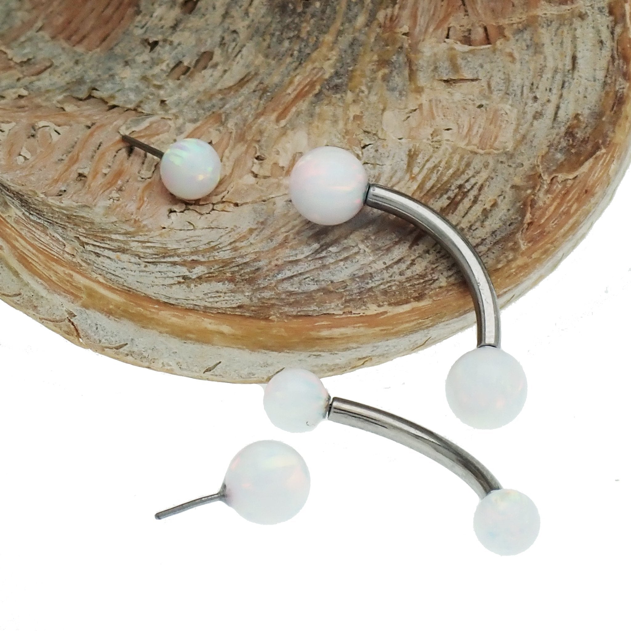 White opal push fit curve belly bar by Body Clickers, 14g or 16g body jewelry with 10mm length and 4mm opal.