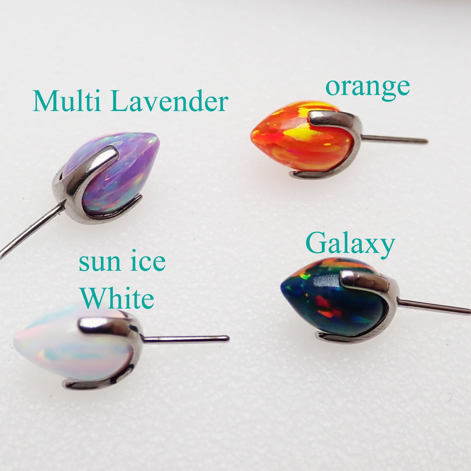 Opal Bullet Push Fit Curve body jewelry by Body Clickers, available in 14g and 16g sizes, featuring galaxy-style opal accents.