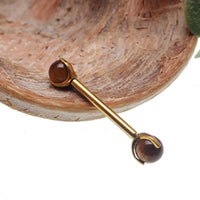 Titanium nipple bar with 5mm Tiger's Eye ball, 14g and 12g body jewelry by Body Clickers, featuring a sleek design and natural stone accents.