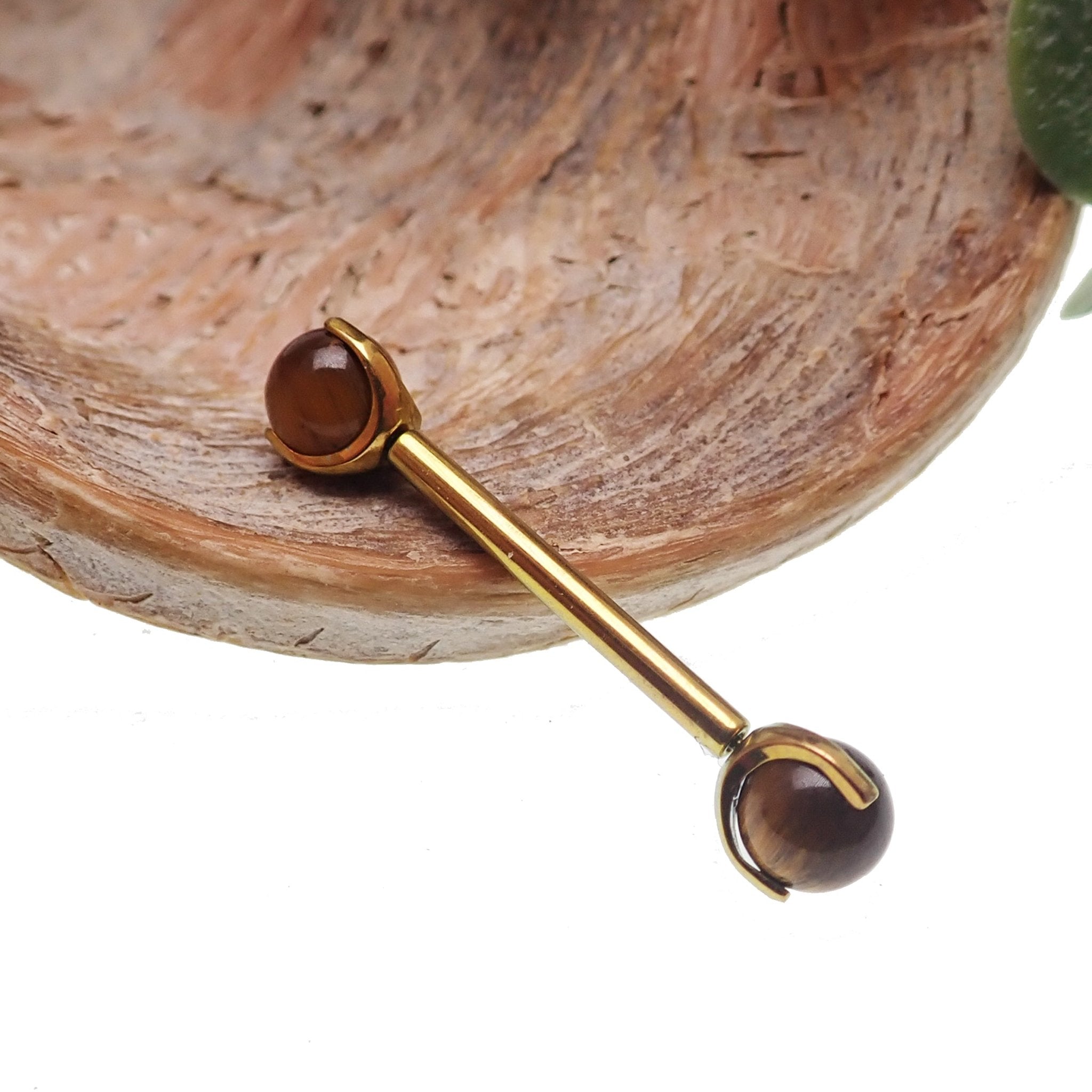 Titanium nipple bar with 5mm Tiger's Eye ball, 14g and 12g body jewelry by Body Clickers, featuring a sleek design and natural stone accents.