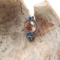Beaded burnt orange and teal labret body jewelry in 14g, 16g, 18g by Body Clickers, featuring colorful beaded design.