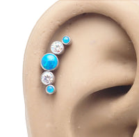 Blue Opal and rainbow CZ helix cluster body jewelry in 14g, 16g, or 18g with a spiral design and vibrant colors.