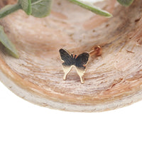 Butterfly 14k gold flat back body jewelry in 14g, 16g, 18g, or 20g sizes, featuring a delicate butterfly design.