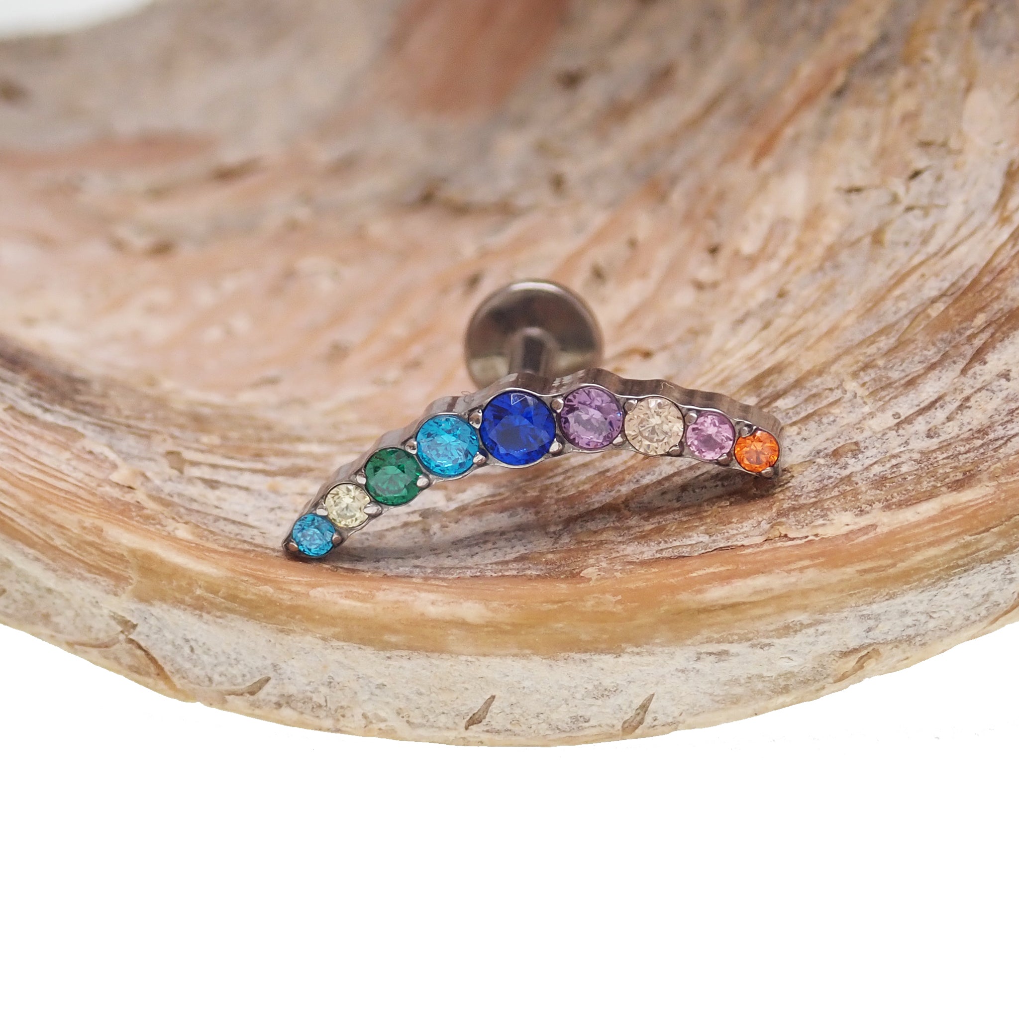 Colorful CZ 9-cluster flat back body jewelry from Body Clickers in 14g, 16g, and 18g sizes, showcasing vibrant gemstone detail.