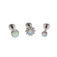 Set of Body Clickers body jewelry featuring opalite peach, CZ flower, and round push-fit designs in 14g, 16g, 18g, and 20g sizes.