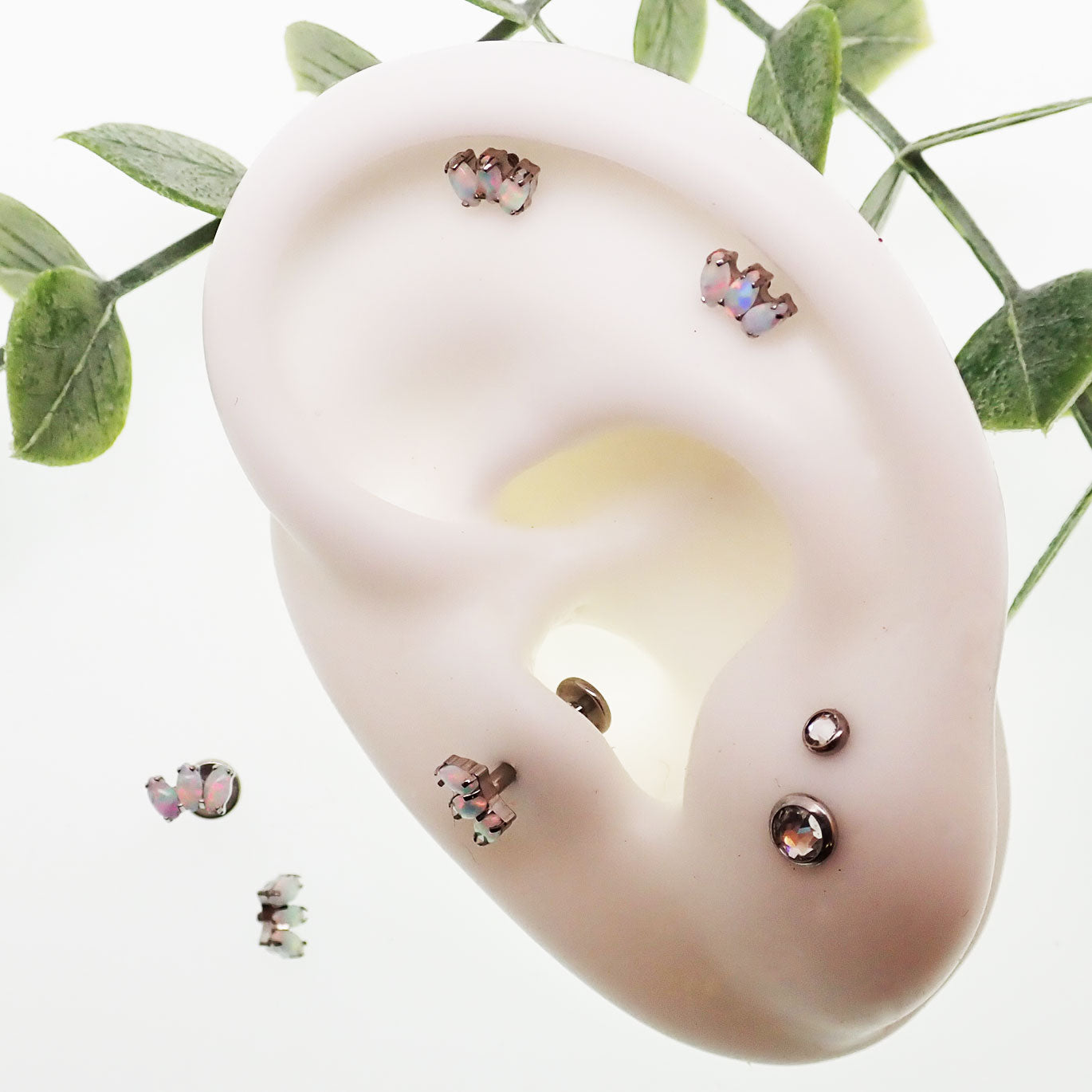 Marquise opal fan flat back body jewelry by Body Clickers in 14g, 16g, 18g, featuring a sparkling opal gemstone.