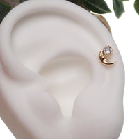 14k gold moon with face and star body jewelry, flat back 14g and 16g, from Body Clickers.