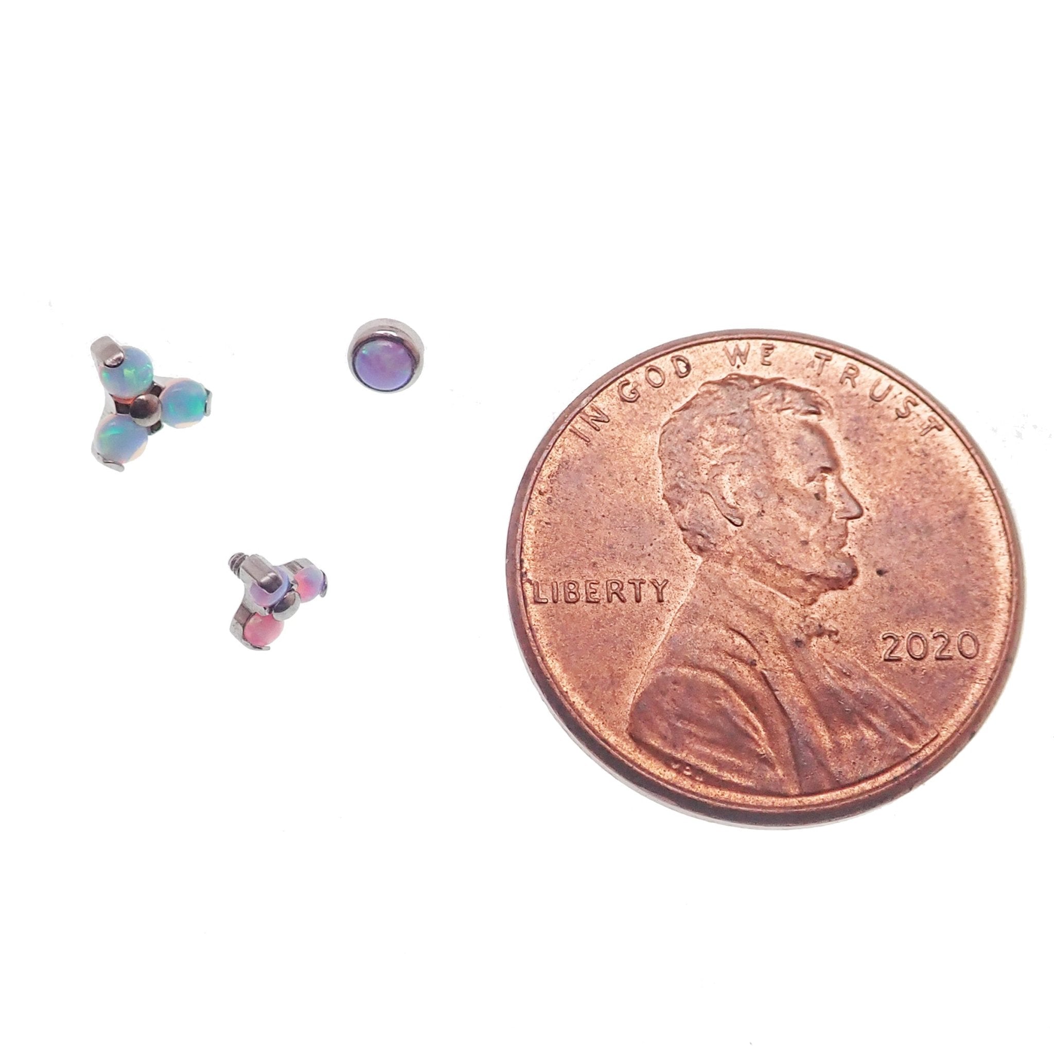 Set of 3 Body Clickers body jewelry with angel opal and bubblegum opal clusters in 14g, 16g, and 18g sizes.